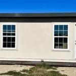 An outside front view of a MUPPS from FSG living buildings. This is a Tiny home and multi use portable panel structure.